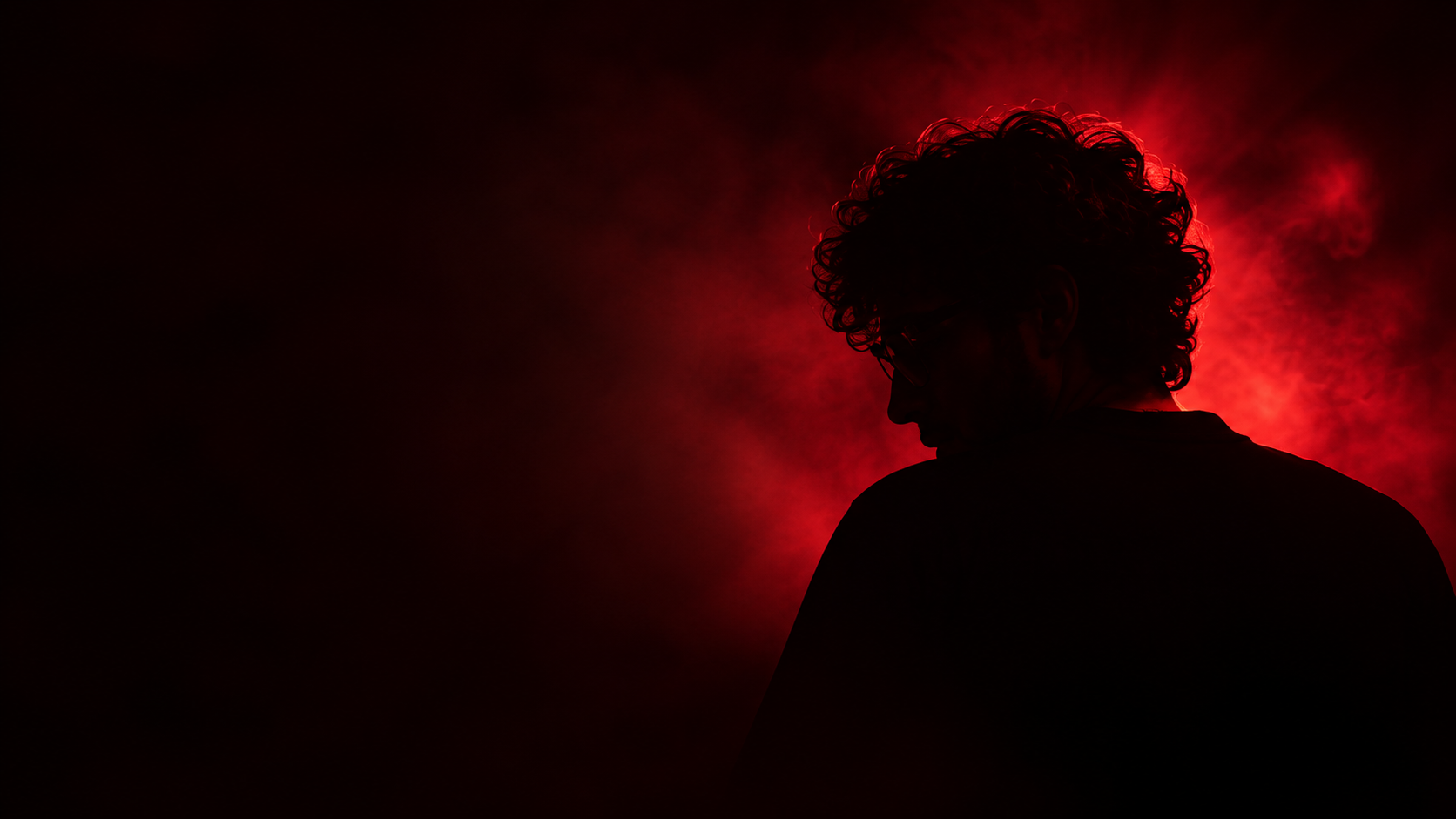 Marco Neon in red stage light